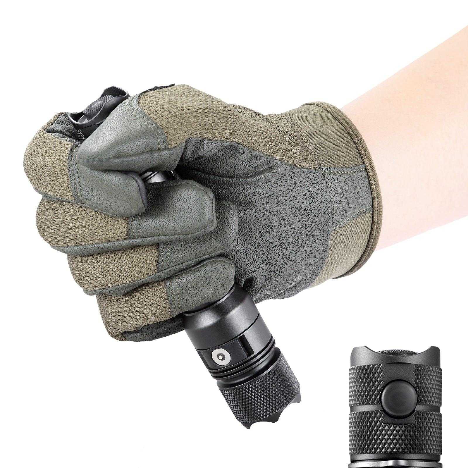 Hand holding Powertac E9 GEN5 flashlight with tactical glove, showing compact size and secure grip