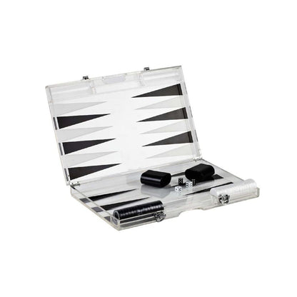 Premium lucite backgammon set in black and white acrylic, open board with monochrome pieces and dice on a white studio background