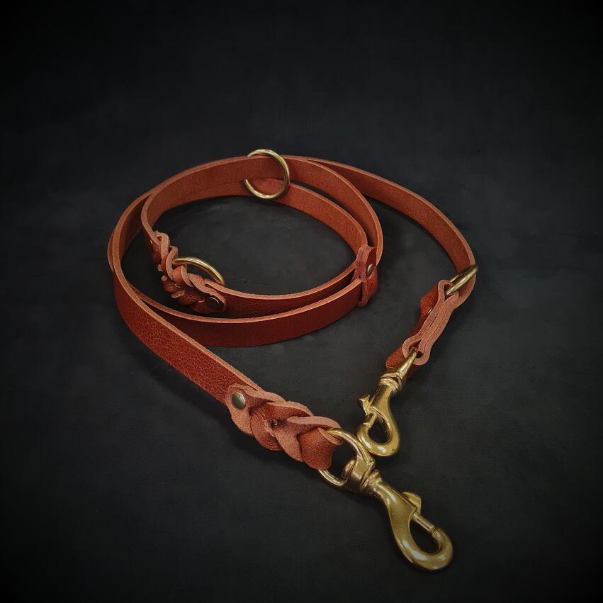 Adjustable 6-foot buffalo leather dog leash shown in extended configuration, demonstrating strength, flexibility, and premium craftsmanship.