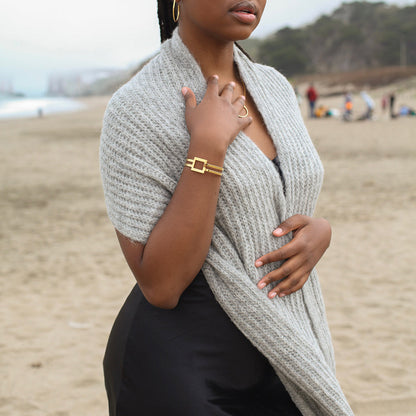 Woman wearing a Chunky Gray Knit Alpaca Scarf