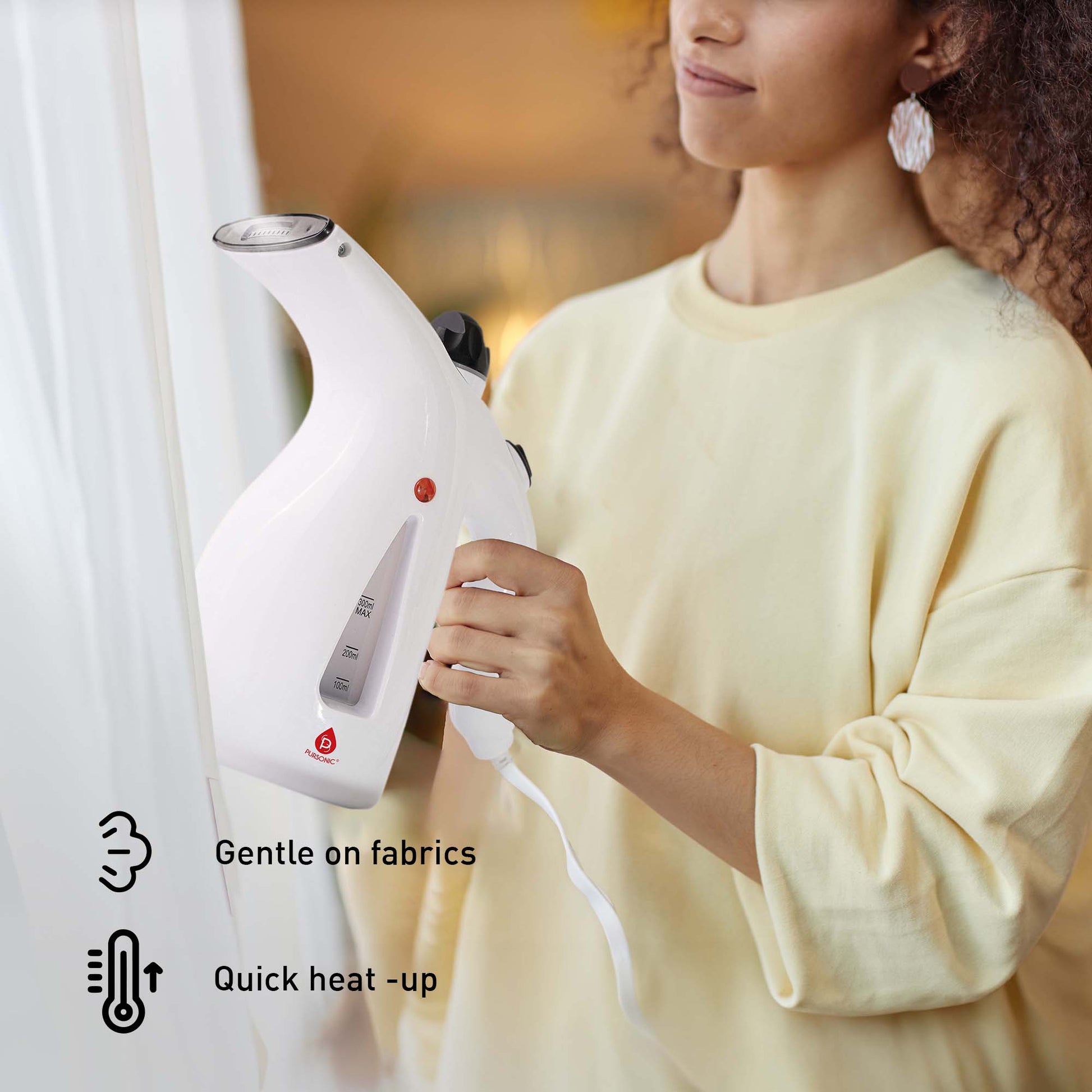 Person using the Pursonic handheld garment steamer to remove wrinkles from clothing, showing quick and gentle fabric care.