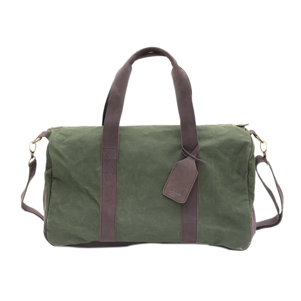 Green duffel bag with brown leather straps on a white background