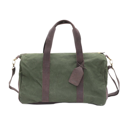 Green duffel bag with brown leather straps on a white background